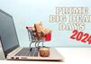 Laptop und Einkaufswagen teasern die Amazon Prime Big Deal Days im Oktober an