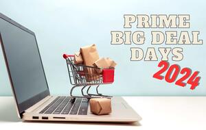 Laptop und Einkaufswagen teasern die Amazon Prime Big Deal Days im Oktober an