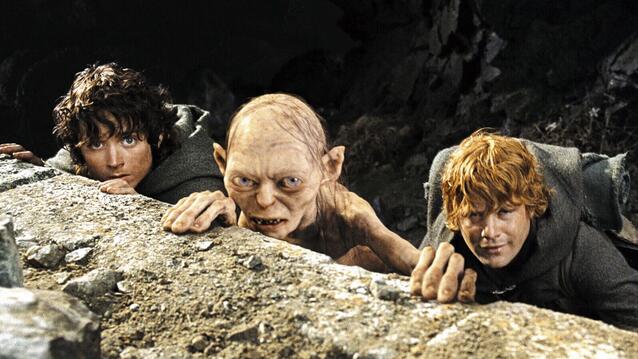 Frodo, Gollum und Sam verstecken sich